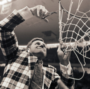 Cutting down net after NCAA championship win, March 25 1974