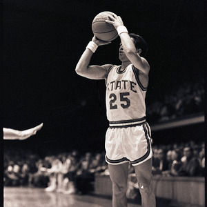 Basketball player at NC State vs. Athletes in Action game, circa 1973-1974