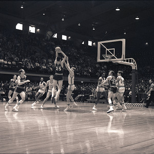 Basketball players at NC State vs. Clemson, circa 1969