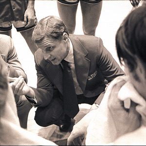 Basketball players around Norm Sloan at NC State vs. Clemson, circa 1969 -1975