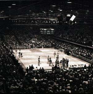 Basketball court and spectators at NC State versus Duke game, circa 1972-1975