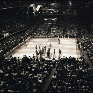 Basketball court and spectators at NC State versus Duke game, circa 1972-1975