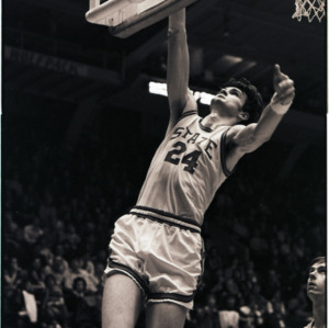 Basketball players at NC State versus East Carolina game, circa 1972-1975