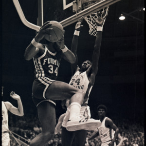 Basketball players at NC State versus Furman game, circa 1972-1975