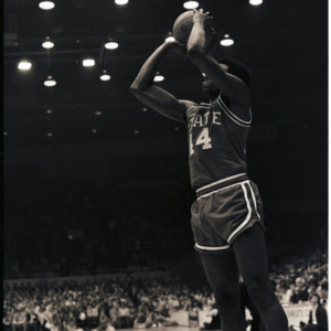 Basketball player at NC State versus Furman game, circa 1972-1975