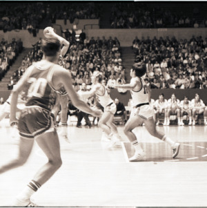 Basketball players at NC State versus Georgia game, circa 1969-1975
