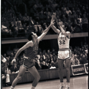 Basketball players at NC State versus Georgia game, circa 1969-1975