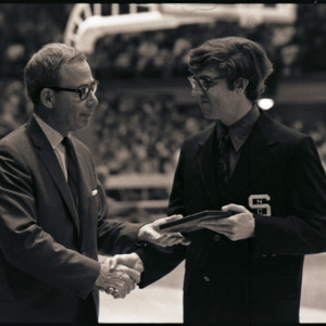 Award presentation at NC State versus Lehigh basketball game, circa 1972-1973