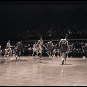 Basketball players at NC State versus Maryland game, circa 1969