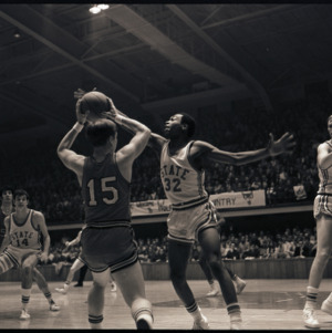 Basketball players at NC State versus Maryland game, circa 1969