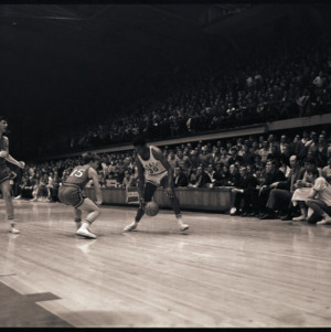 Basketball players at NC State versus Maryland game, circa 1969