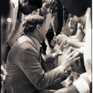 Basketball coach and players at NC State versus Maryland game, circa 1973-1974