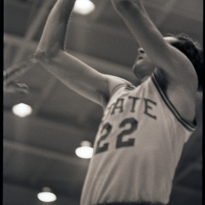 Basketball player at NC State versus Maryland, circa 1973-1974