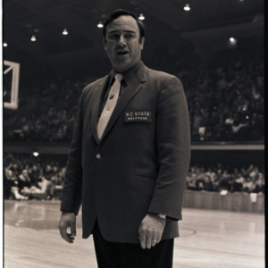 Basketball coach at NC State versus Maryland game, circa 1969-1975