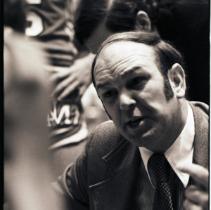 Maryland basketball coach Lefty Driesell and players at NC State versus Maryland game, circa 1969-1975