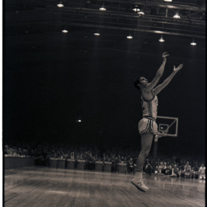 Basketball player at NC State versus Maryland game, circa 1969-1975