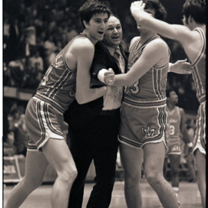 Maryland basketball coach Lefty Driesell and players at NC State versus Maryland game, circa 1969-1975