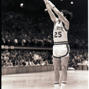Basketball player at NC State versus Maryland game, circa 1972-1975