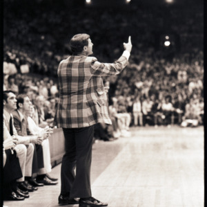 Basketball coach at NC State versus Maryland game, circa 1972-1975