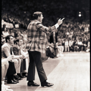 Basketball coach at NC State versus Maryland game, circa 1972-1975