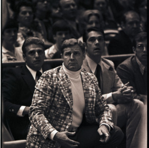 Basketball coaches and spectators at NC State versus Maryland game, circa 1972-1975