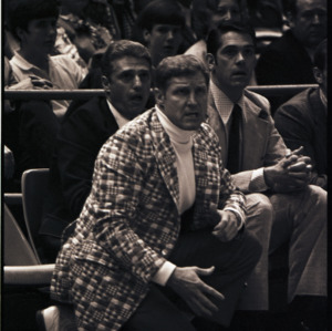 Basketball coaches and spectators at NC State versus Maryland game, circa 1972-1975