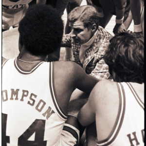 Basketball coach talking to players at NC State versus Maryland ACC title game, 1973