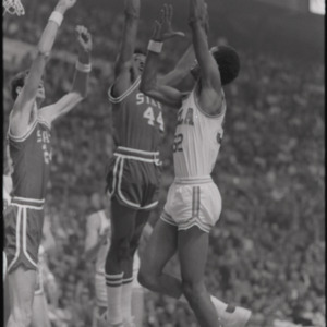 David Thompson going for block at NC State versus UCLA basketball game, circa 1973-1974