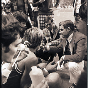 Basketball players and coaches at NC State versus UCLA game, circa 1973-1974