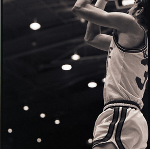 Basketball player at NC State versus UNC-Chapel Hill game, circa 1971-1973