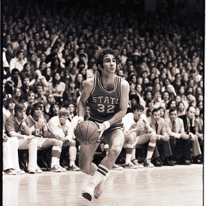 Basketball player at NC State versus UNC-Chapel Hill game, circa 1973-1974