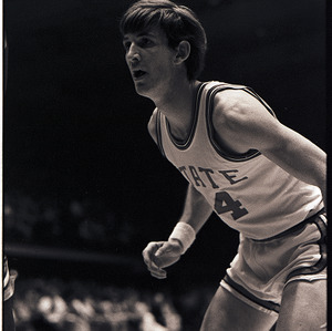 Basketball player at NC State versus UNC-Chapel Hill game, circa 1973-1974