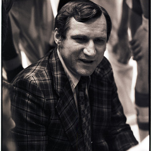Basketball coach at NC State versus UNC-Chapel Hill game, circa 1973-1974