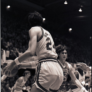 Basketball players at NC State versus UNC-Chapel Hill game, circa 1969-1975