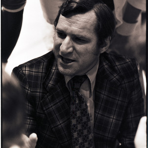 Basketball coach at NC State versus UNC-Chapel Hill game, circa 1972-1975