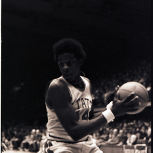 Basketball player at NC State versus UNC-Charlotte game, circa 1972-1974