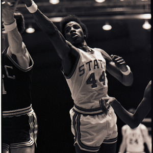 Basketball player at NC State versus UNC-Charlotte game, circa 1972-1974