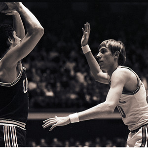 Basketball players at NC State versus UNC-Charlotte game, circa 1972-1974