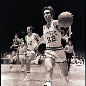 Basketball players at NC State versus UNC-Charlotte game, circa 1972-1974