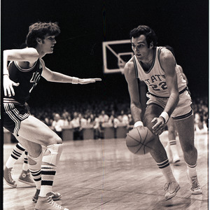 Basketball players at NC State versus UNC-Charlotte game, circa 1972-1974