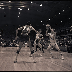 Basketball players at NC State versus University of South Carolina game, circa 1969