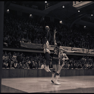 Basketball players at NC State versus University of South Carolina game, circa 1969