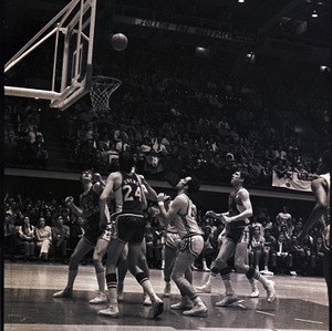 Basketball players at NC State versus University of South Carolina game, 1970 or 1971
