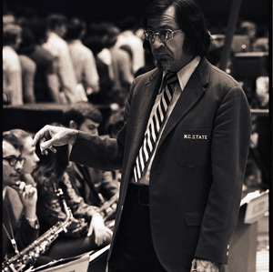 Band director and members at NC State versus Virginia basketball game, circa 1971-1972