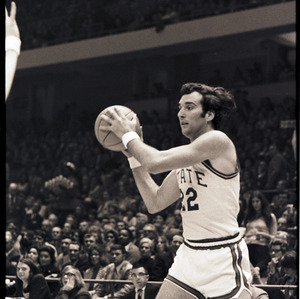 Basketball player at NC State versus Virginia game, circa 1972-1975