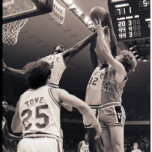 Basketball players at NC State versus Virginia game, circa 1972-1975