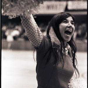 Cheerleader at NC State versus Virginia basketball game, circa 1972-1975