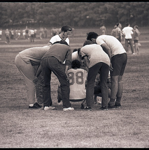 Football players at scrimmage, circa 1969-1975