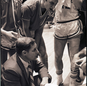 Basketball coach and players at NC State versus Virginia Tech game, circa 1969-1975
