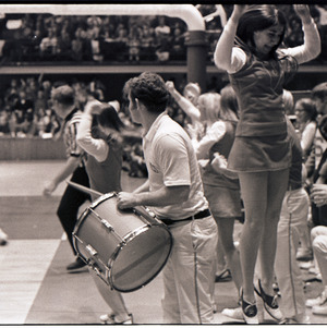 Cheerleaders and band members at NC State versus Wake Forest basketball game, circa 1969-1975
